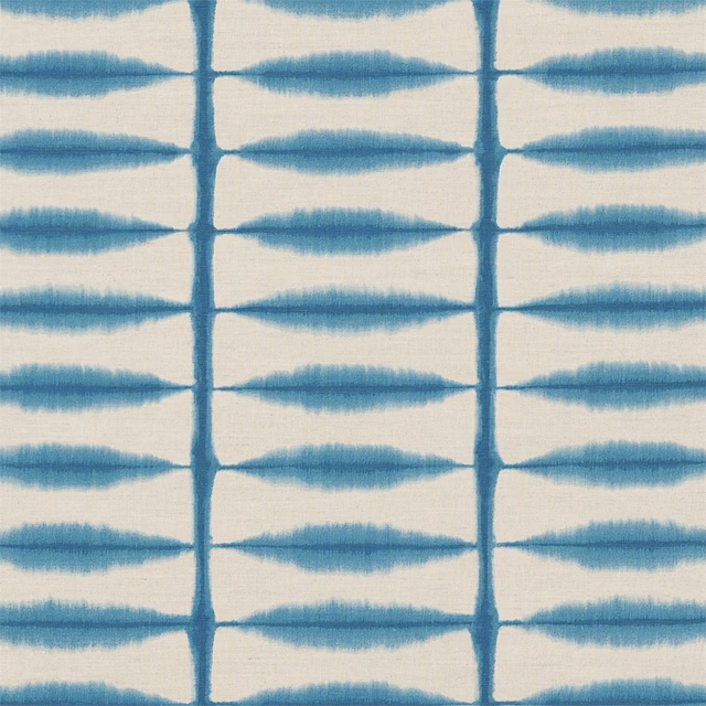 Cool teal spindle motifs in a regular grid over a pale linen ground