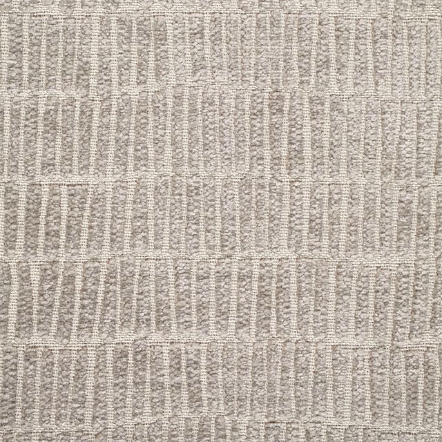 Pale fossil-grey woven textile with broken vertical stripes and ridged geometric bands
