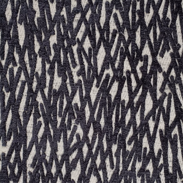 Midnight black and ivory abstract zigzag weave with a coarse, tactile textile surface