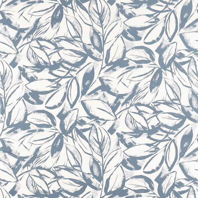 Cool slate-blue botanical leaves painted across an ivory fabric ground