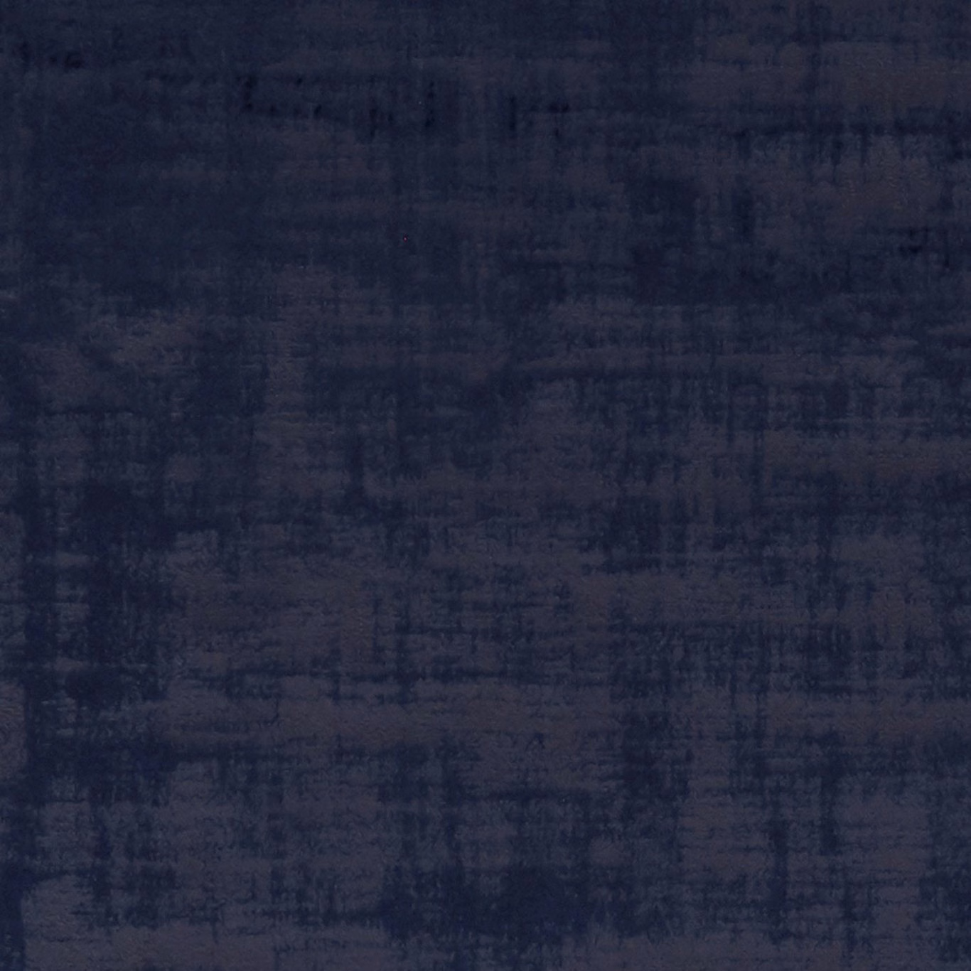 Deep indigo textile with smoky crosshatched brush marks and softly mottled texture