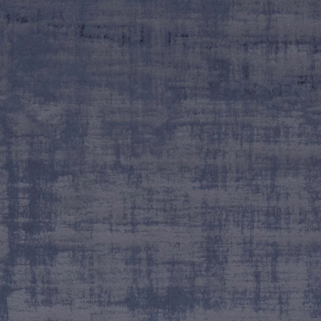 Smoky navy fabric with irregular slate crosshatch markings and a softly textured surface