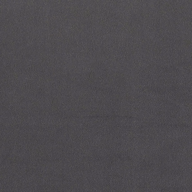 Close-up of deep charcoal-grey fabric with a subtle fine-grained mottled texture