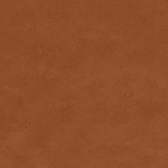 Close-up of warm spice terracotta fabric with a softly mottled surface