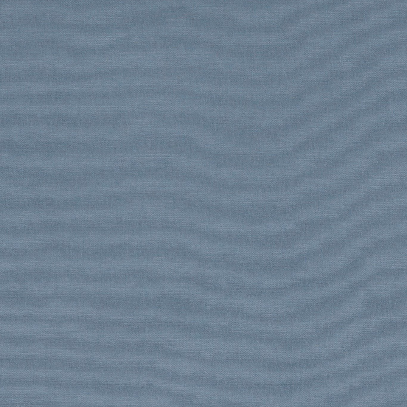 Muted chambray blue fabric with a fine, subtly mottled plain weave