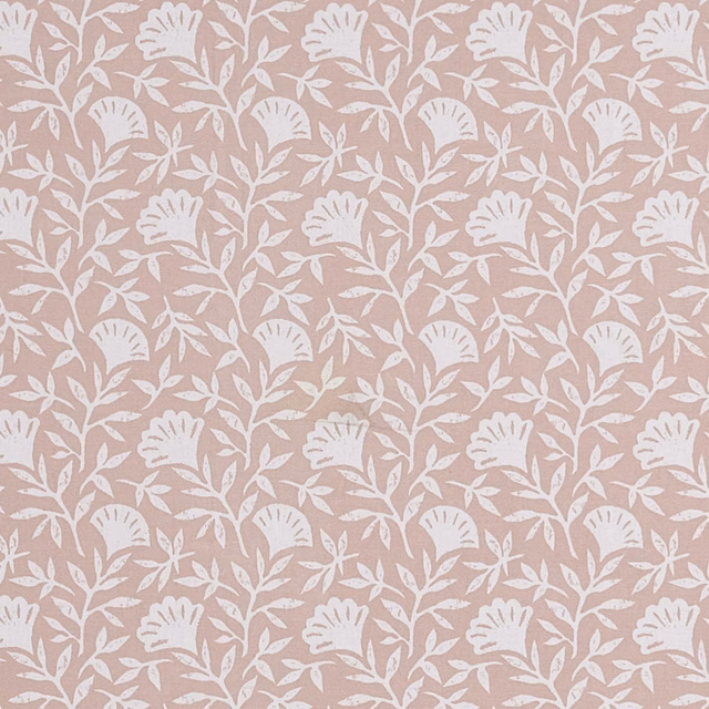 Dusty blush pink fabric with repeating ivory floral vines and subtle woven texture