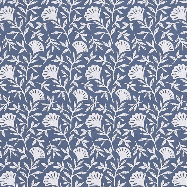 Ivory scalloped flowers and leafy sprigs repeat over a deep midnight-blue ground