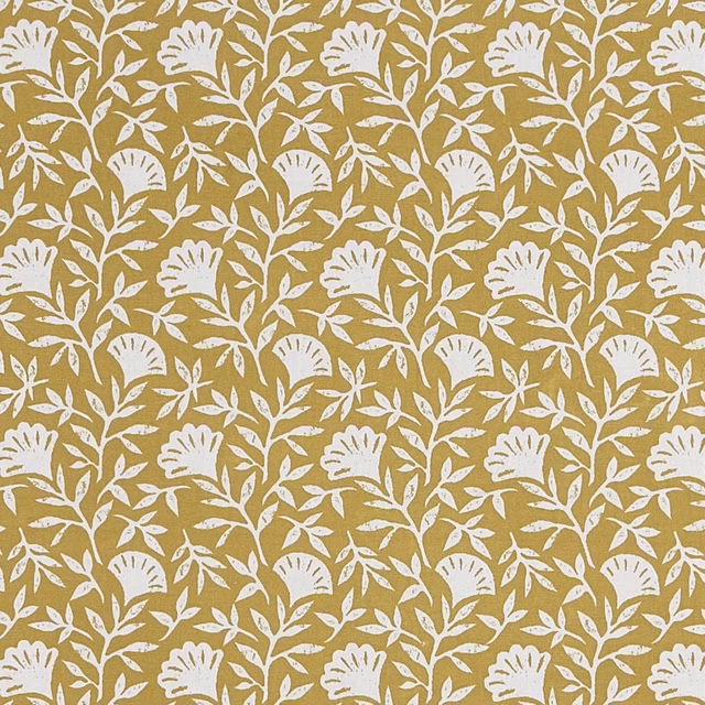 Warm ochre fabric with repeating cream flowers, stems and leafy sprigs