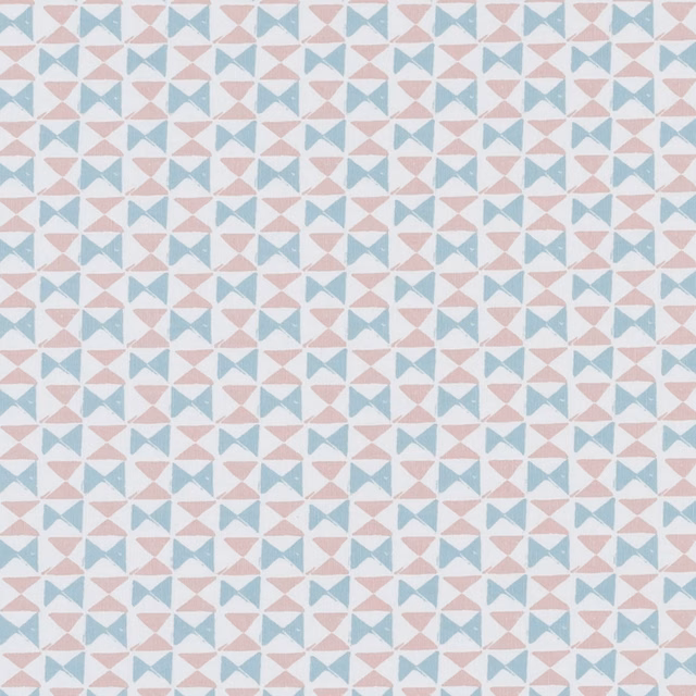 Small blush and mineral-blue bow motifs across a pale textile ground