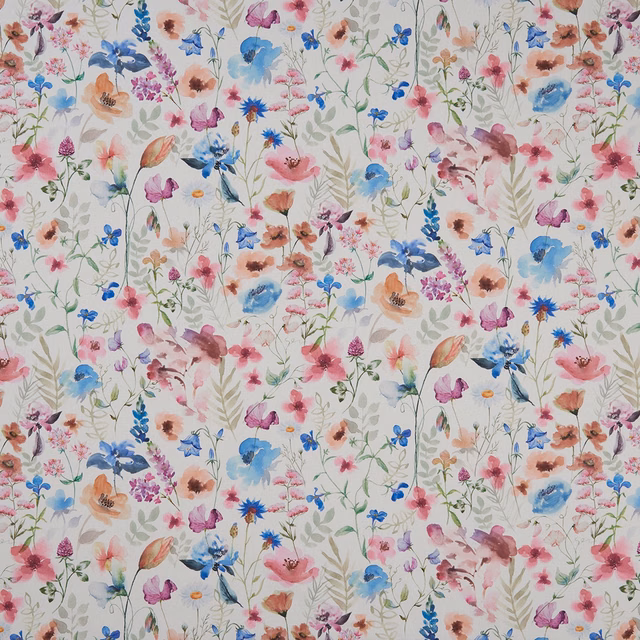 Cream floral fabric with blue, pink and coral painterly blooms and fine green stems