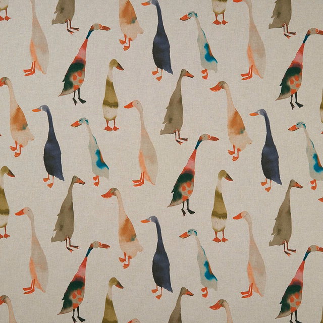 Stone-ground fabric with repeating teal, navy, rust and olive wading birds
