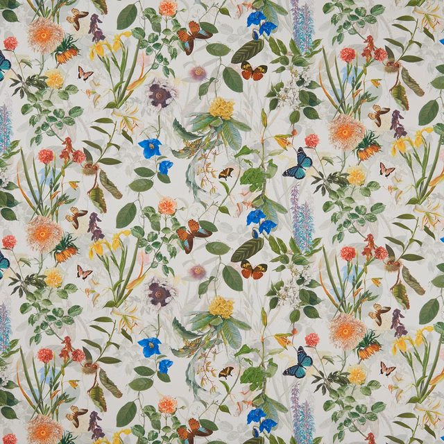 Warm cream botanical fabric with orange flowers, blue blooms, foliage and butterflies
