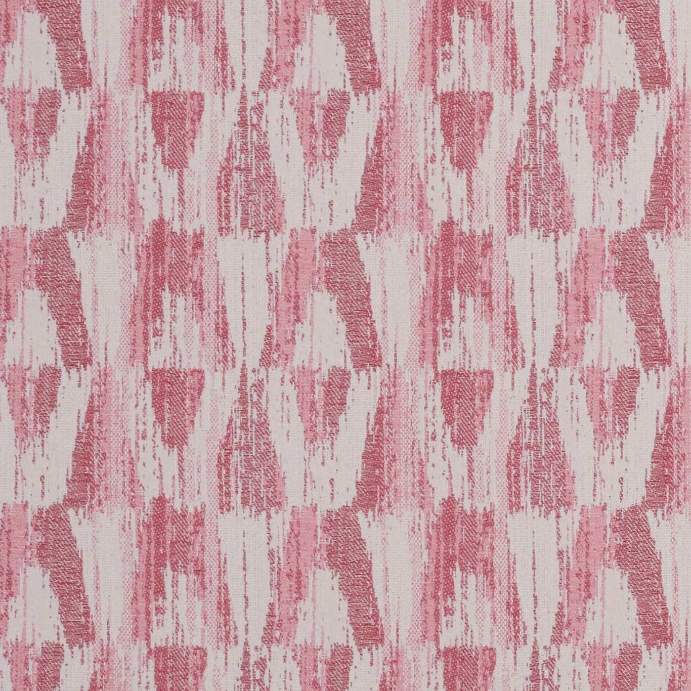 Close-up of raspberry pink and ivory woven ikat-style abstract fabric texture