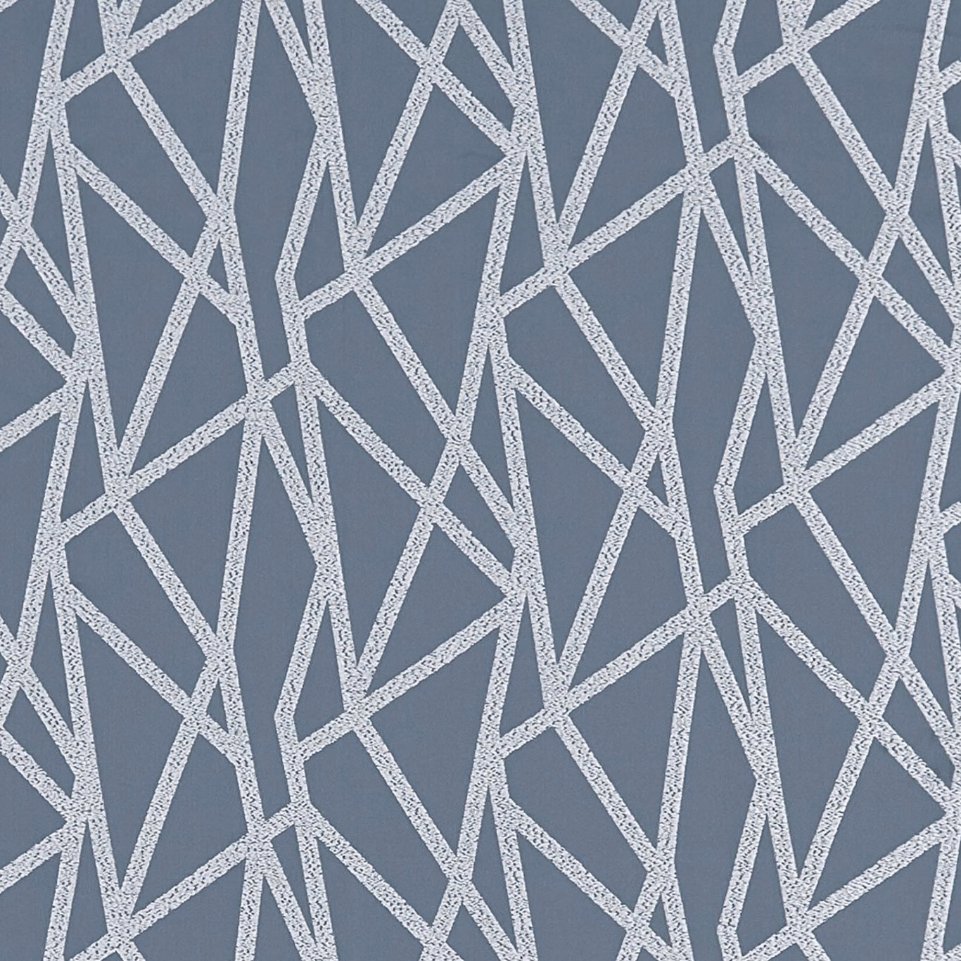 Slate blue-grey fabric with pale silver angular geometric lines and a tactile woven surface