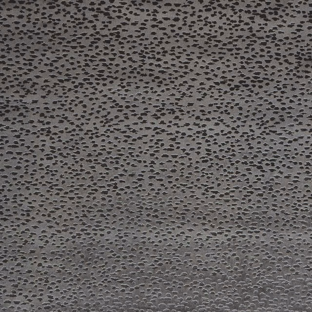 Deep espresso-brown upholstery fabric with dense charcoal pebble-like marks and tactile woven texture