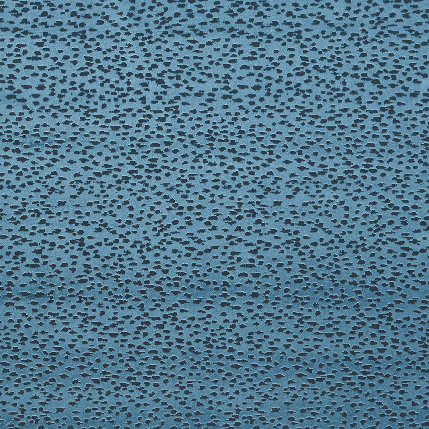 Blue-teal textile with dense charcoal flecks and a subtly textured surface