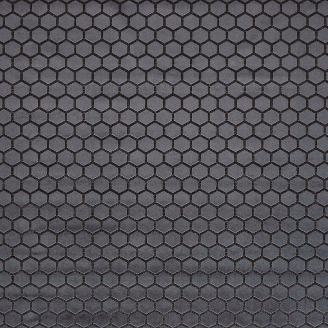 Charcoal grey woven fabric with small black-outlined honeycomb hexagons and subtle texture