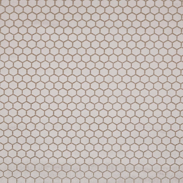 Warm taupe woven textile with outlined hexagons and a softly mottled surface