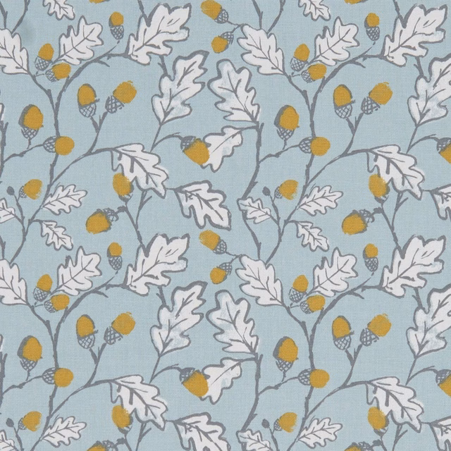 Muted duckegg-blue fabric with white oak leaves, grey branches and mustard acorns