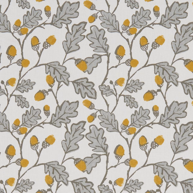 Ivory fabric with grey oak leaves, ochre acorns and curling botanical stems