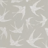 Muted taupe woven fabric with off-white flying swallows and fine visible texture