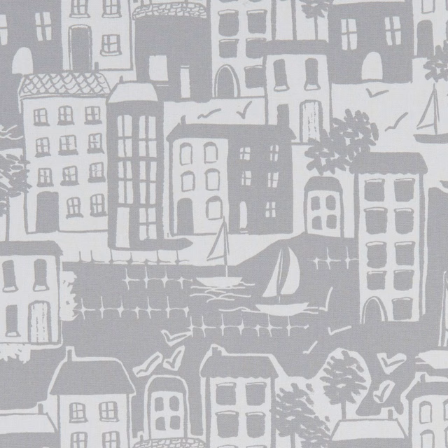 Cool grey harbour-town fabric with pale buildings, sailing boats and rippling water motif
