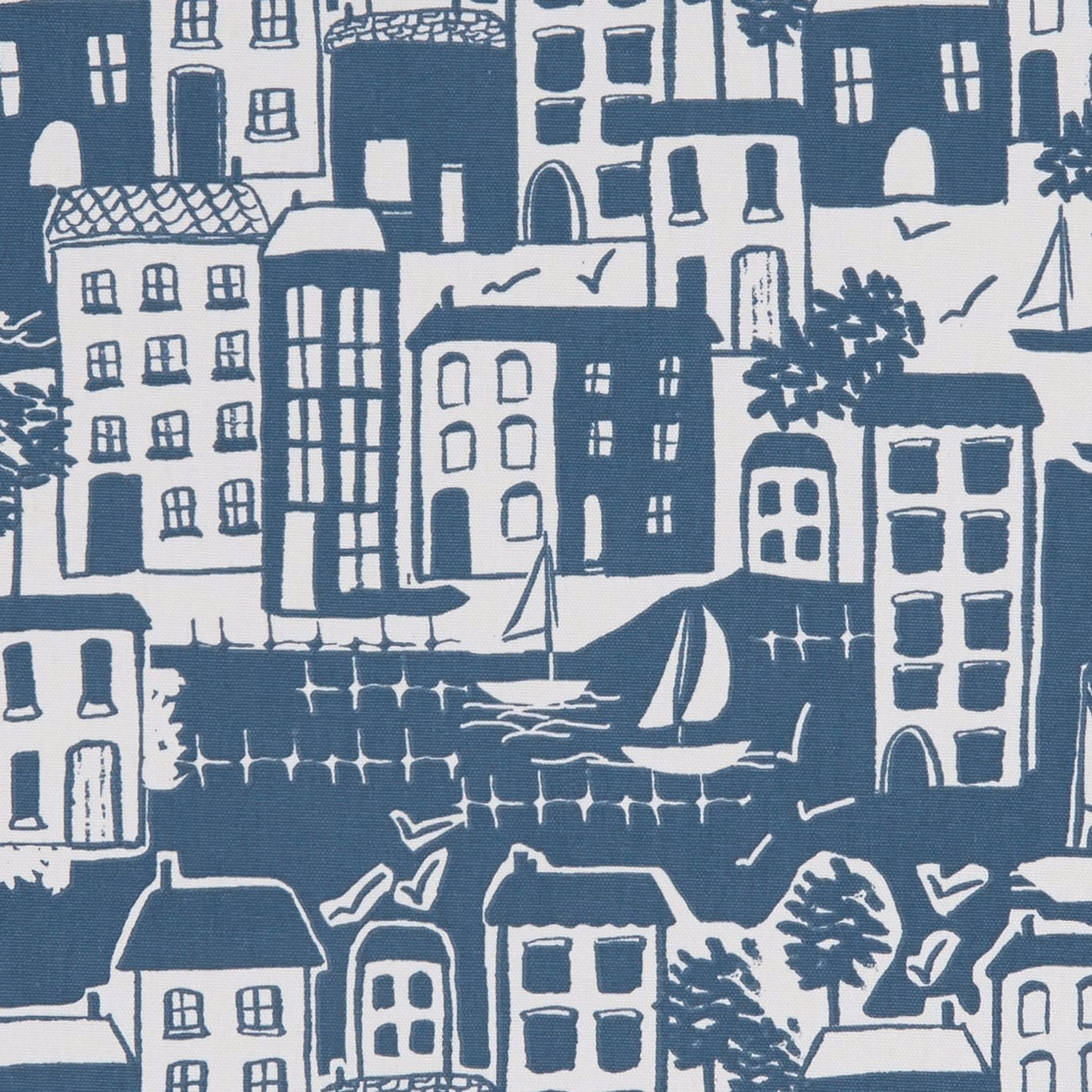 Deep navy harbour town with white buildings, sailboats, trees and water markings