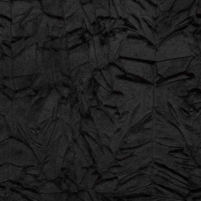 Jet-black textile with shadowy irregular leaf forms and finely crumpled woven texture