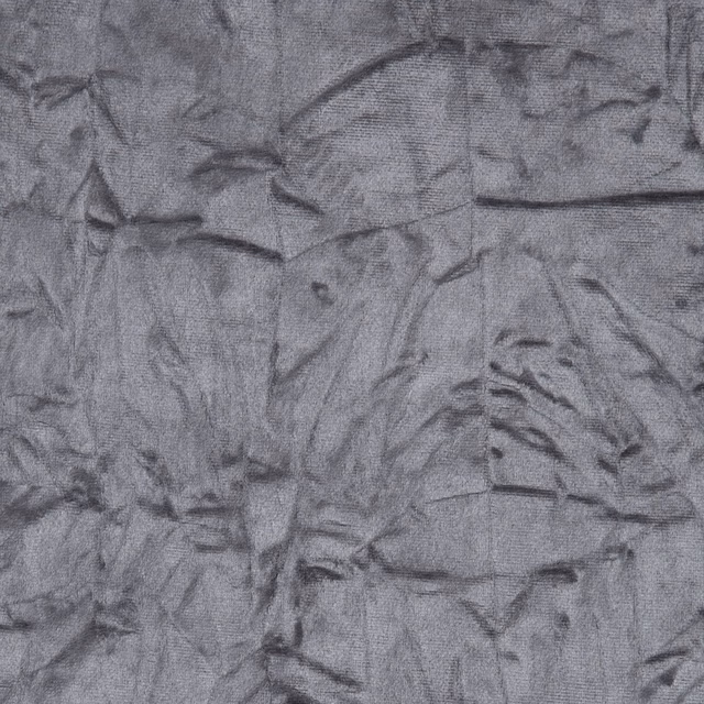 Close-up of cool smoky grey textile with charcoal abstract crumpled linework and woven texture