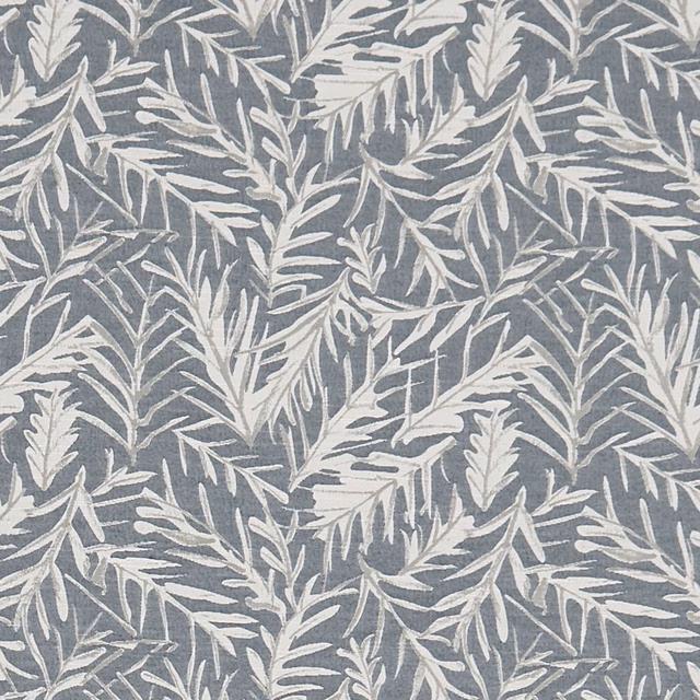 Muted denim-blue ground with intertwined ivory leafy branches in a woven finish