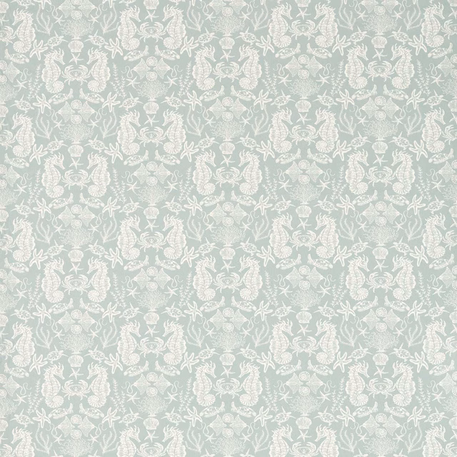 Pale aqua-mint fabric with an intricate white coral, shell and starfish repeat