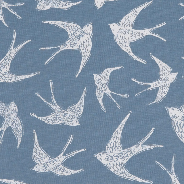 Muted navy woven fabric with ivory flying swallows and fine feather detailing
