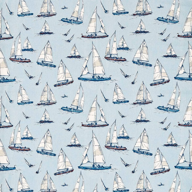 Pale blue fabric with white-sailed boats, navy hulls, red accents and flying seabirds
