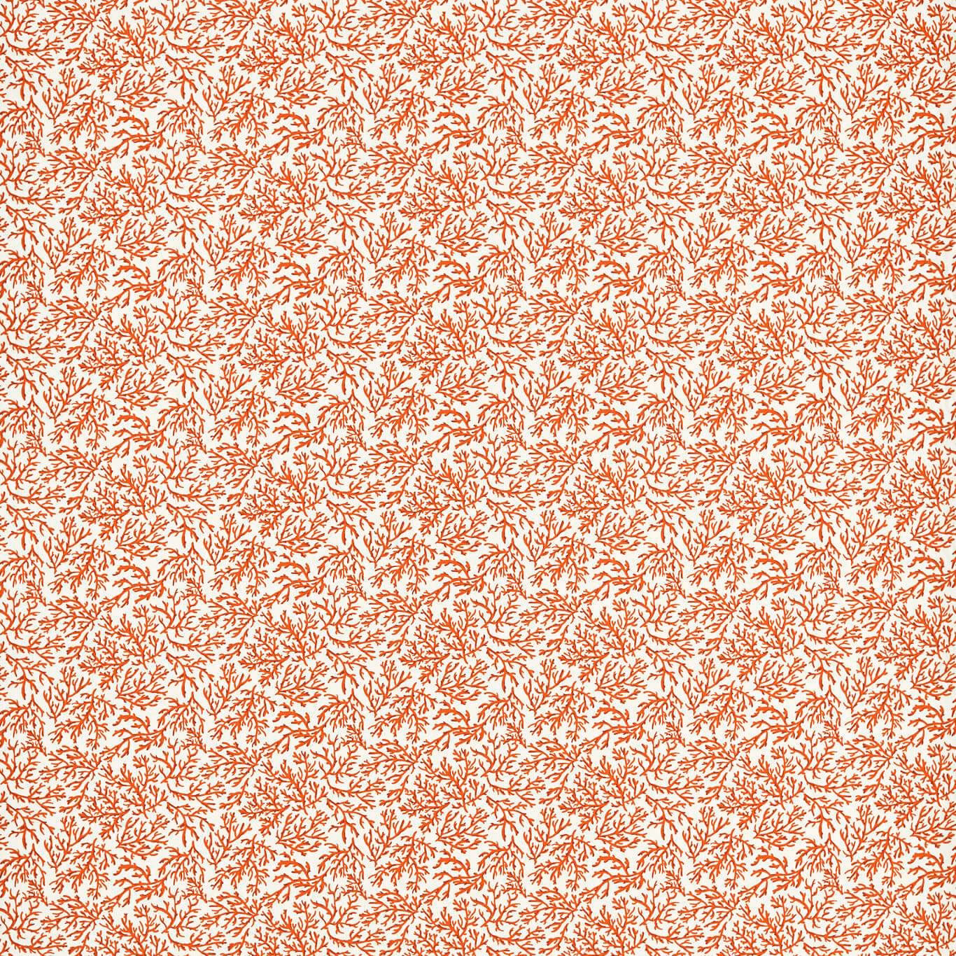 Dense rust-coral branching sprigs scattered across a warm cream fabric ground