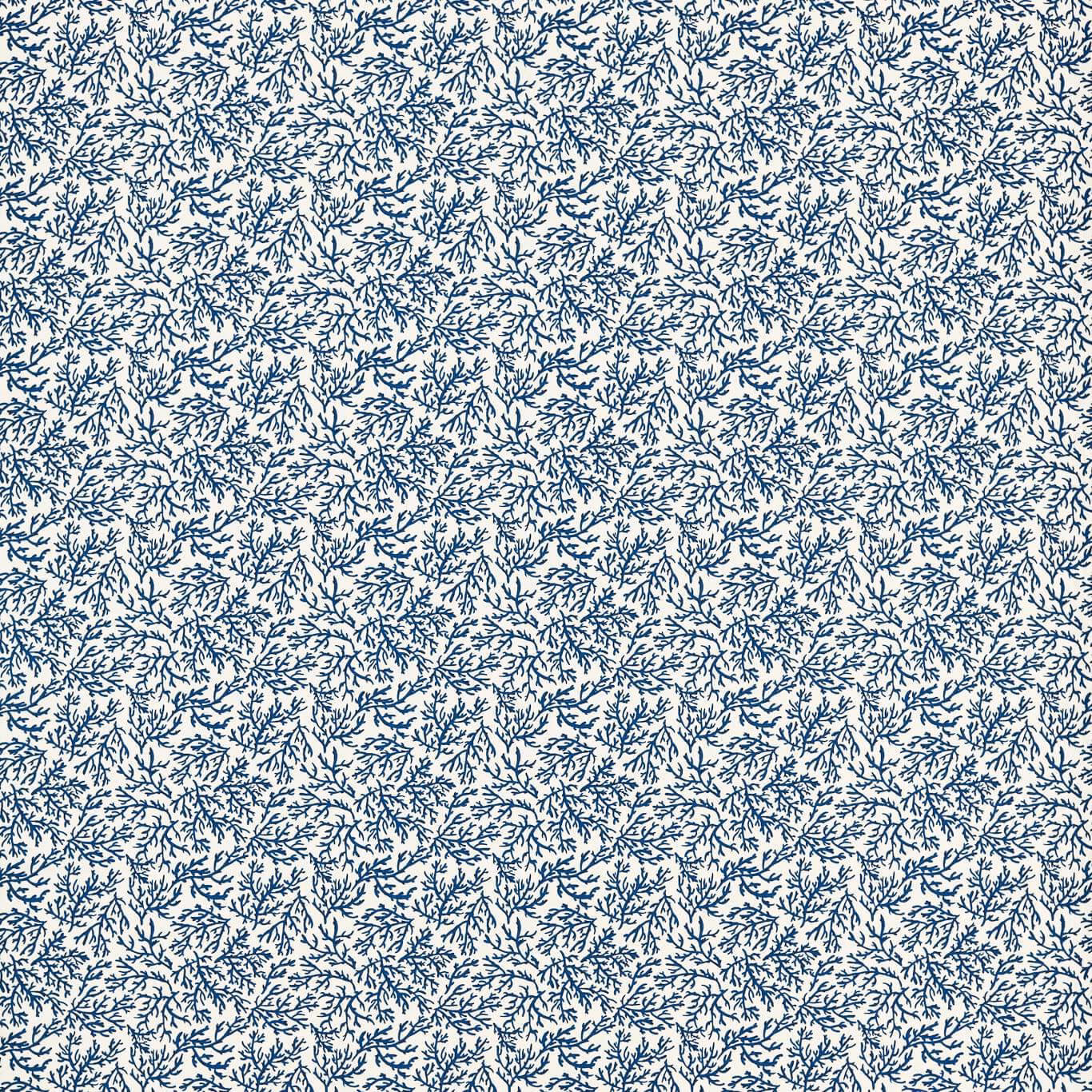 Dense ink-navy botanical sprigs scattered across a pale cream textile