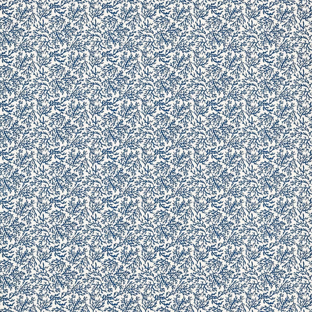 Dense ink-navy botanical sprigs scattered across a pale cream textile