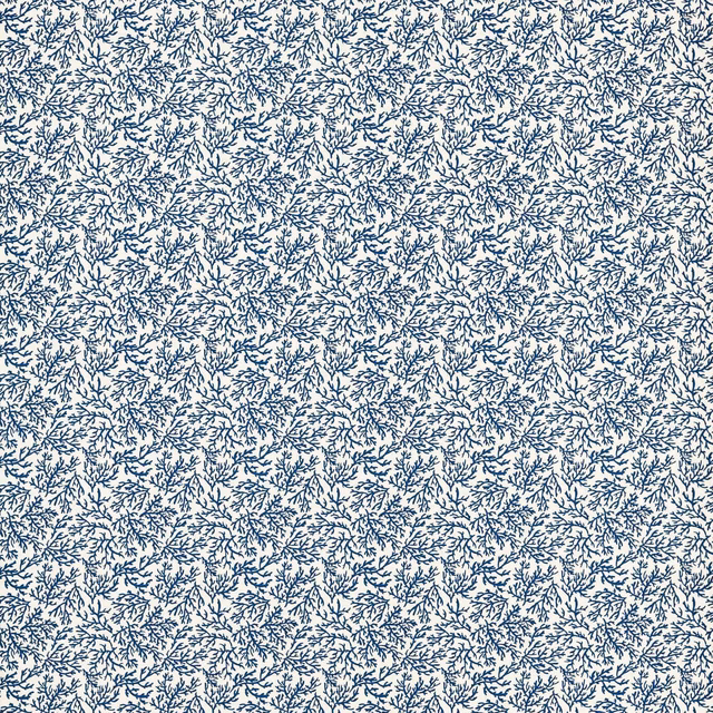 Dense navy branch-like sprigs scattered across a soft cream fabric ground