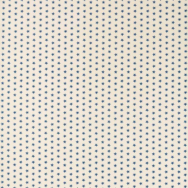 Natural cream textile with dense navy star motifs and subtle woven grain