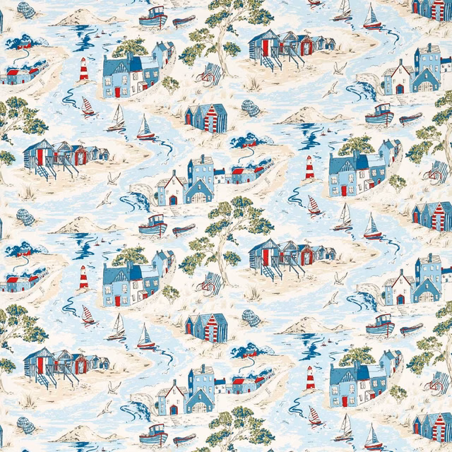 Pale blue coastal scenic fabric with red boats, beach huts and cream ground