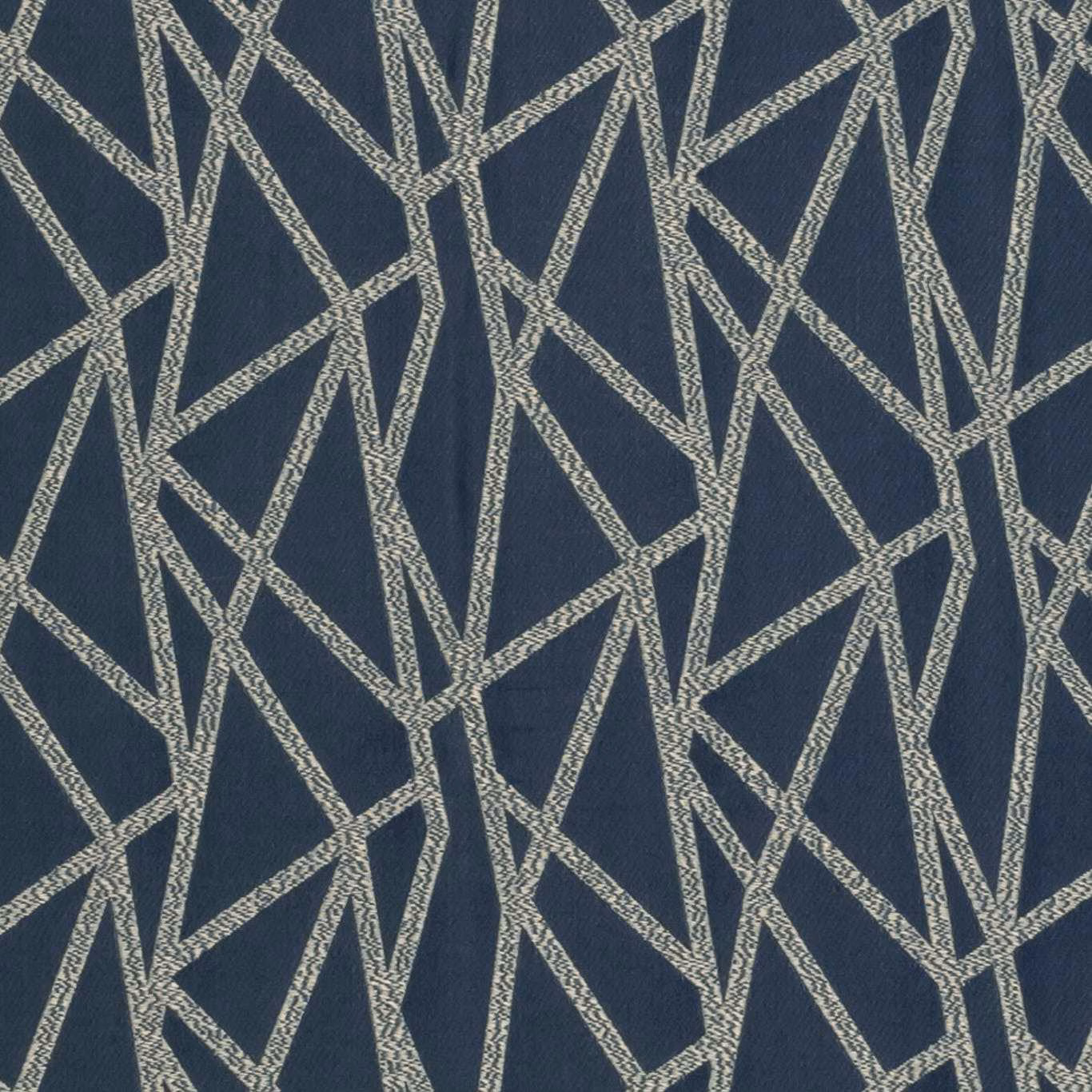 Deep ink-blue woven fabric with pale stone angular lines in an irregular geometric pattern