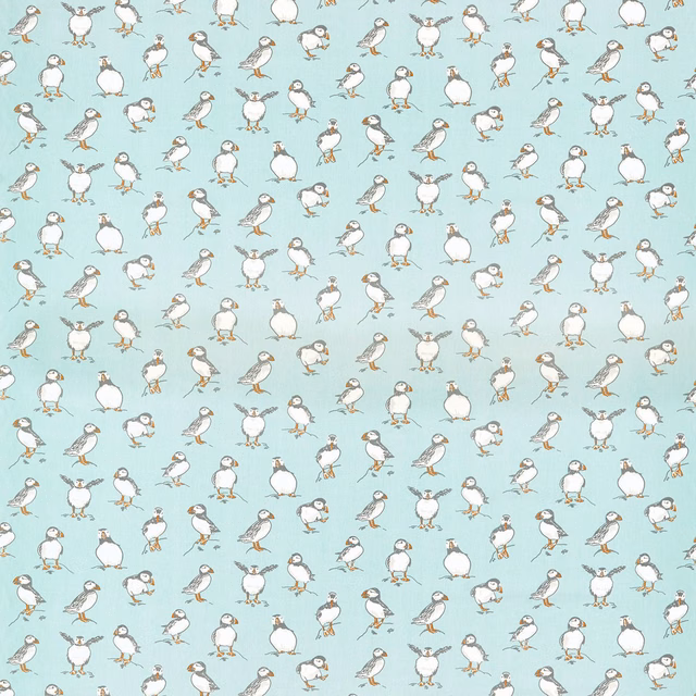 Pale aqua fabric covered with repeating puffins and small seabirds