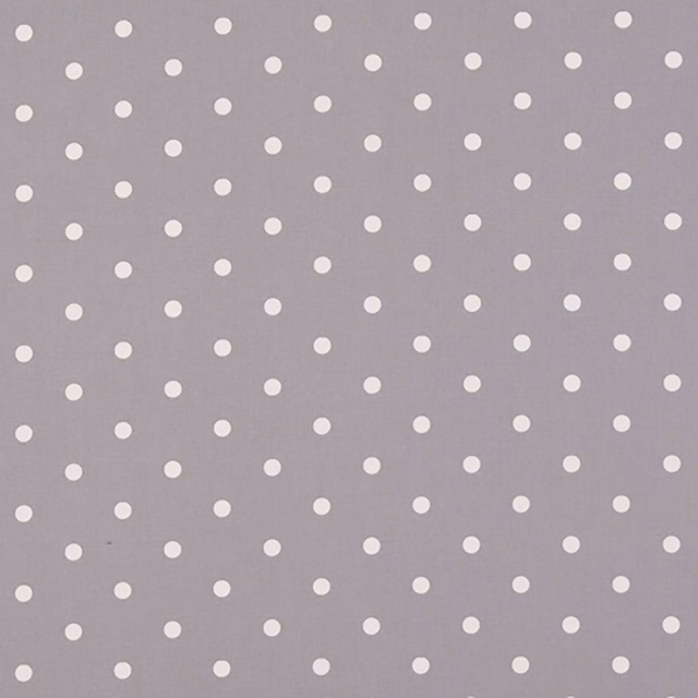 Ivory dots on a cool smoky grey-mauve woven fabric with a matte surface