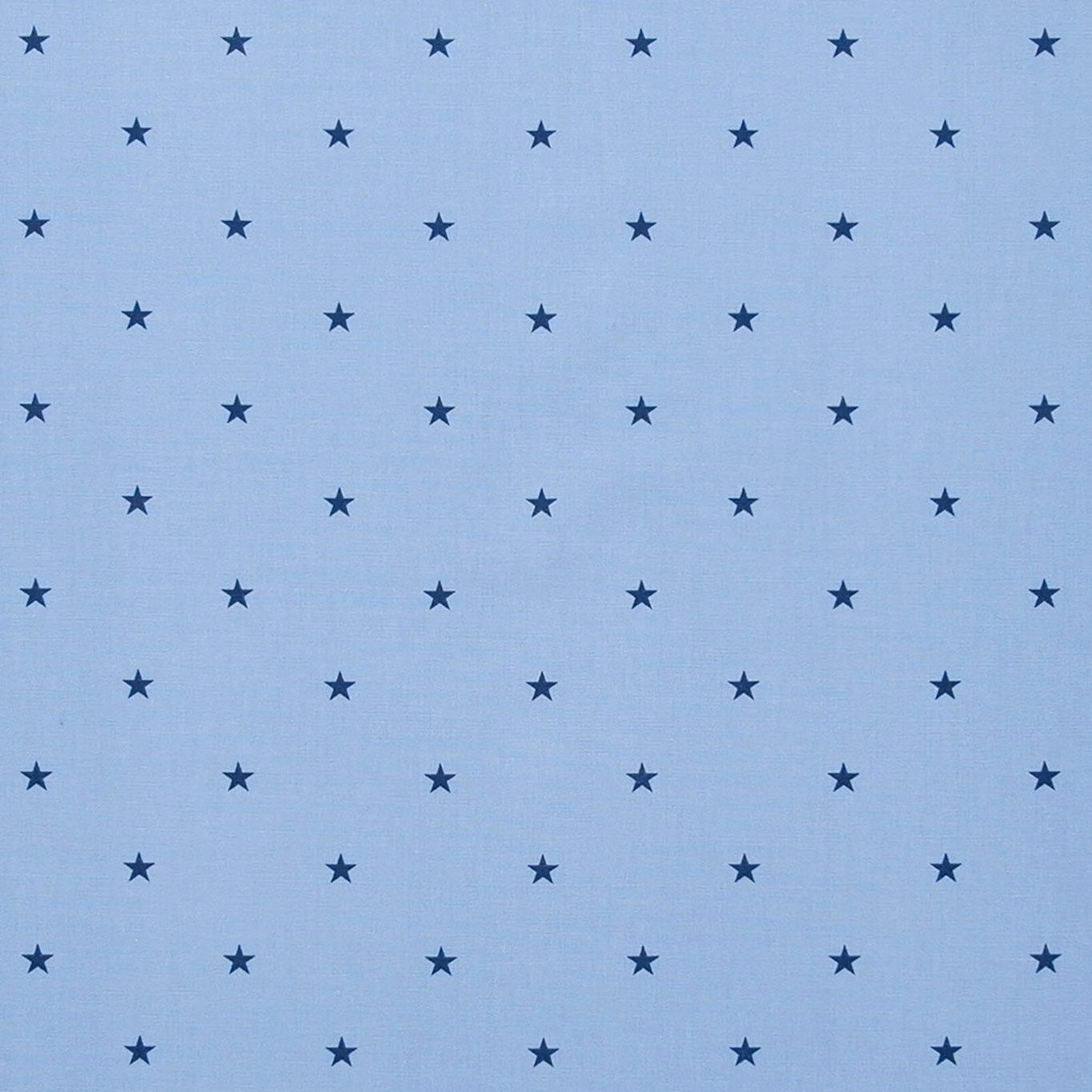 Pale denim-blue woven fabric with evenly spaced small navy stars