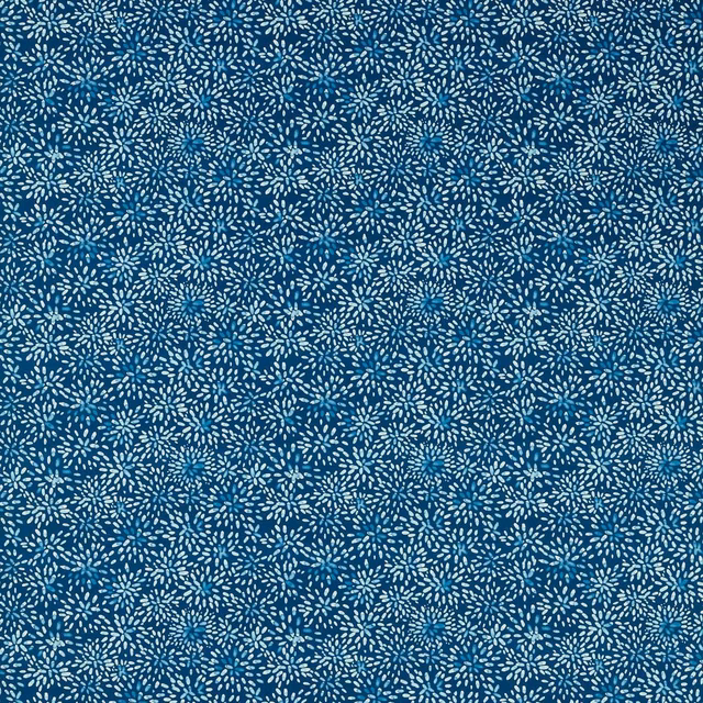 Deep midnight teal fabric with densely packed pale blue-white sprig motifs