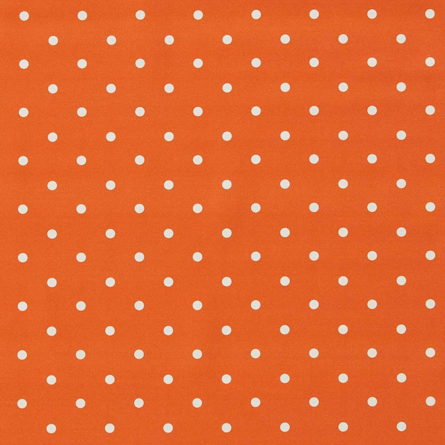 Burnt-orange fabric with evenly spaced small ivory dots and subtle surface texture