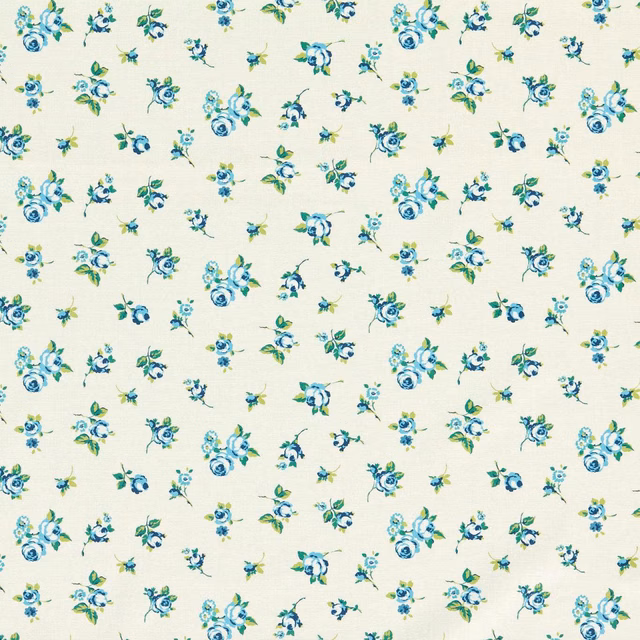 Cream fabric with scattered cobalt, turquoise and green floral sprigs