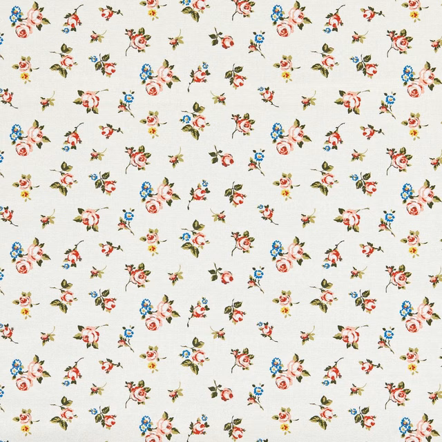 Cream woven fabric with scattered rose bouquets, blue flowers and green leaves