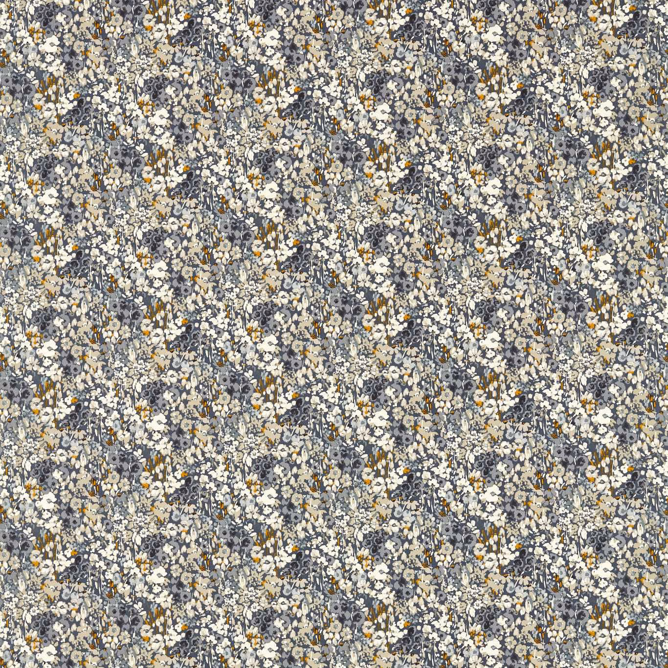 Dense denim-blue floral textile with cream blossoms and scattered saffron flecks