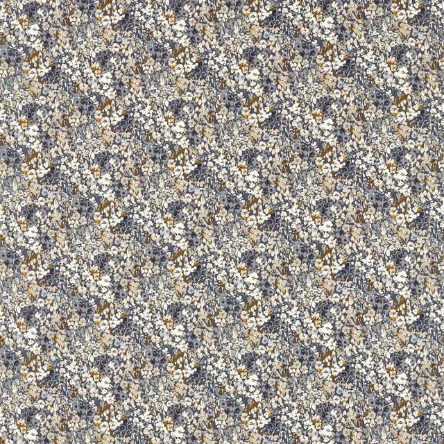 Dense denim-blue floral textile with cream blossoms and scattered saffron flecks