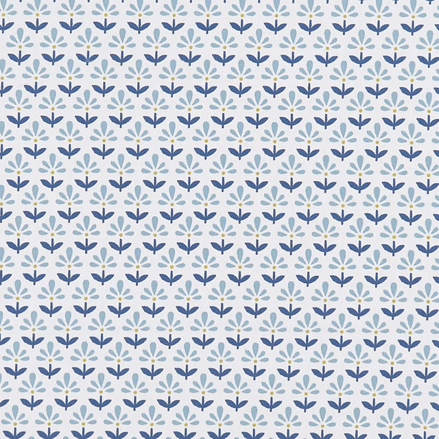 Denim-blue and pale yellow floral sprigs repeated across a pale blue fabric ground